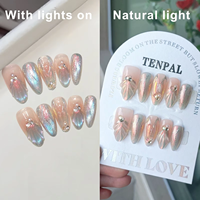 10 faux ongles press-on faits main, forme amande, style français, effet sirène œil de chat, avec perles brillantes, strass et dégradé bleu scintillant