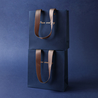Sacs cadeaux de luxe en papier kraft bleu roi avec logo personnalisé et poignée en ruban, sans minimum de commande, en pâte de bois vierge de qualité supérieure pour montres et lunettes