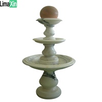 Fontaine à billes rotative en marbre avec sphère flottante en pierre de marbre de Chine unique