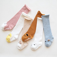 Automne et hiver nouveau bébé bas Point colle antidérapant Curling bouche lâche enfant en bas âge genou chaussettes hautes