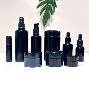 ขวดแก้วสีดำเข้มป้องกันรังสียูวีสำหรับครีมเครื่องสำอาง ขนาด 100 มล. 150 มล. 50 มล. ทรงกลม พร้อมฝาสีดำแบบโค้ง - Product Image 4