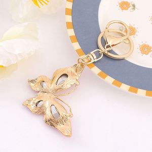 Porte-clés Papillon en Métal Style Coréen Tendance avec Strass Colorés, Pendentif Créatif en Cristal pour Sac à Dos et Clés de Voiture - Product Image 4