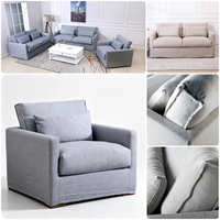Fauteuil de loisirs monoplace en tissu lin lavable, style français moderne, avec cadre en chêne massif et assise profonde, vente en gros