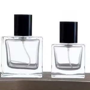 Venta al por mayor botella de perfume de vidrio 30ml 50ml 100mL botella dispensadora de bayoneta de aerosol cuadrado botella de perfume de vidrio cuadrado transparente
