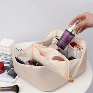 กระเป๋าเครื่องสำอางแบบพกพาปี 2024 กันน้ำ ขนาดใหญ่ ทำจากหนัง PU สำหรับผู้หญิง กระเป๋าใส่เครื่องสำอางคุณภาพสูงพร้อมช่องแบ่ง - Product Image 5