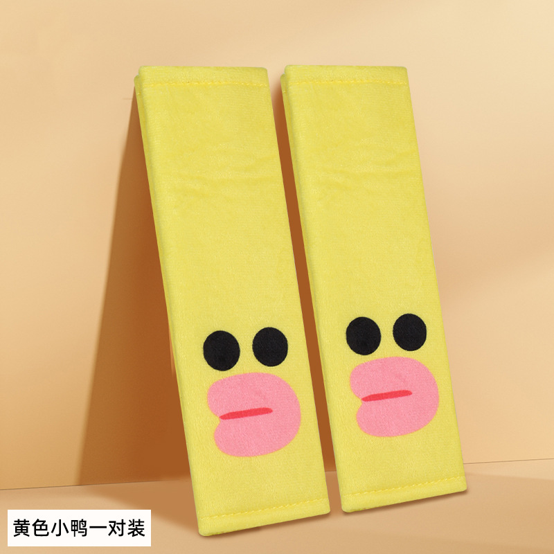 Une paire de canards jaunes