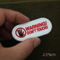 AVERTISSEMENT : Ne pas toucher - Prohibire le contact - Petit patch moral en PVC - Badge de bras en caoutchouc souple