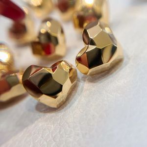 Xinfly <b>Fine</b> Jewelry Supplier Women Fashion Luxury Pure Real 18k Gold Hollow Heart Shape <b>Stud</b> <b>Earrings</b> - Product Image 1