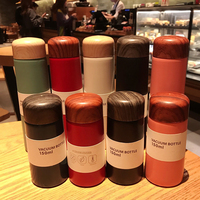 Échantillon gratuit 150ml 250ml Mini mignon portable en acier inoxydable isolé sous vide bouteille d'eau tasse à café avec passoire à thé pour le voyage