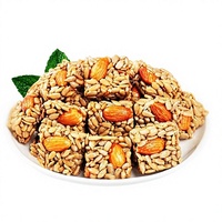 Croustilles de graines de melon et d'amandes, collation nutritive, populaire en ligne, friandises de graines grillées, mélange de noix du Fujian, vente en gros en cartons entiers