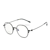 Montura de gafas ópticas redondas de titanio unisex, monturas de gafas graduadas ligeras a la moda