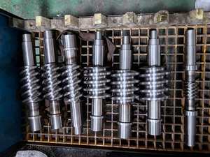 Eje helicoidal de mecanizado cnc de alta precisión personalizado de fábrica de China y juego de engranajes helicoidales para pieza de accionamiento - Product Image 6