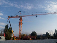 Grue à tour QTZ315-HS7050 de 20T avec longueur de flèche de 70M, moteur, boîte de vitesses, roulement et moteur à haut moment de charge