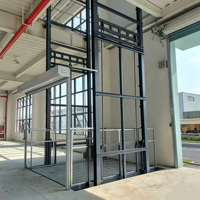 Plateforme élévatrice verticale hydraulique stationnaire robuste pour charges lourdes en usine