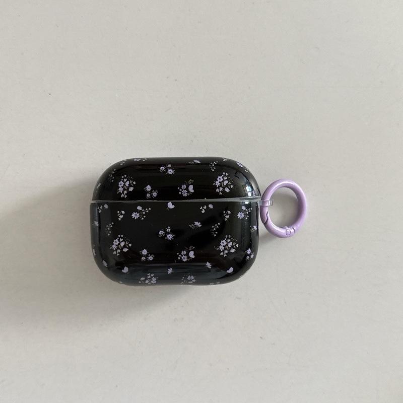 Black background with small floral pattern