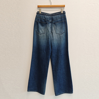 Jean évasé vintage délavé pour femme avec ceinture tressée, taille haute et double poche plaquée en denim