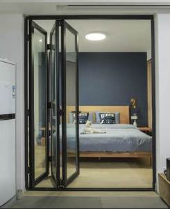 Système de pliage en verre moderne VOBO Vulcan-Portes de qualité structurelle pliables pour entrepôts, baies de chargement et hôtels - Product Image 1