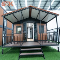 Maison modulaire préfabriquée en conteneur, prix d'usine, personnalisée, 2 chambres, 1 salon avec véranda et auvent, imperméable