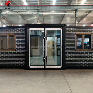 Maison conteneur pliable et extensible en acier préfabriqué, 2 chambres, 1 salle de bain, entièrement meublée, installation rapide et économique, pour usage résidentiel ou bureau. - Product Image 4