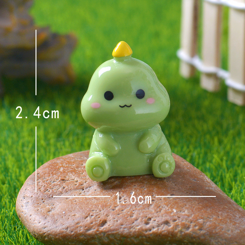 Dinosaure assis vert