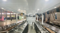 Restaurant en conteneur préfabriqué avec un aménagement multifonctionnel, comptoir de bar et salle à manger privée pour une entreprise de restauration polyvalente