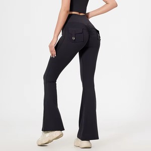 Pantalones de yoga acampanados sin costuras con cintura elástica alta, bolsillos traseros y efecto realce de glúteos, de color liso, en Spandex/Nylon - Product Image 5