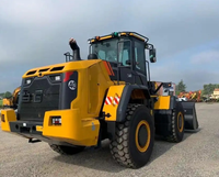 Pelle de chargement 848H : Interface d'attachement polyvalente, configuration flexible pour la manutention de pierre, de terre et de matériaux de construction