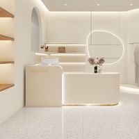 Comptoir de réception pour spa personnalisé multicolore à DEL Comptoirs de réception pour salon de beauté au design minimaliste pour salon de coiffure