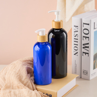 Bouteille de lotion en plastique PET écologique bleue et noire de 300 ml et 500 ml, calibre 24 et 28, flacon pompe vide pour l'emballage de conditionneur capillaire