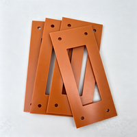 Support de découpe de panneaux en bakélite rouge-orange sur mesure pour pièces isolantes d'équipements électriques