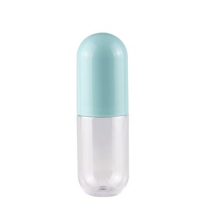 Nouveau design 60ml capsule <span class=keywords><strong>forme</strong></span> <span class=keywords><strong>bleu</strong></span> <span class=keywords><strong>rose</strong></span> clair <span class=keywords><strong>bouteille</strong></span> corps coloré bouchon <span class=keywords><strong>bouteille</strong></span> <span class=keywords><strong>en</strong></span> plastique pour bonbons alimentaire emballage conteneur - Product Image 4
