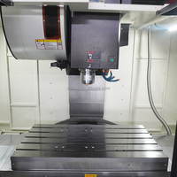 Centre d'usinage vertical CNC 3 axes TDV1165, commande FANUC, broche BT40, broche simple, neuf, fabrication taïwanaise