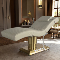 Lit de beauté électrique HAOYU de luxe moderne pour salon de beauté, prix d'usine, 3 moteurs, base en acier inoxydable doré, cuir PU, pliable