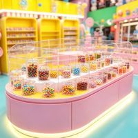 Agencement complet de confiserie CIRI : Rénovation et décoration sur mesure, vitrine de luxe pour chocolats avec éclairage LED
