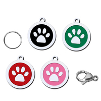 Accessoires pour animaux de compagnie en gros : Pendentif d'identification circulaire en alliage de zinc pour chien, avec lettrage et empreinte de patte, anti-évasion
