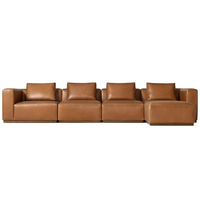Canapé modulaire en cuir de haute qualité avec assise cascade et coussins rembourrés, idéal pour hôtel et salon
