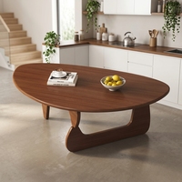 Table basse en bois massif de design japonais avec plateau en forme d'alien pour salon et balcon au style minimaliste moderne