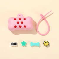 Distributeur portable de sacs à déjections pour animaux de compagnie, en silicone souple, en forme d'os de dessin animé, étui de rangement pour sacs à déjections canines pour les promenades quotidiennes avec le chien