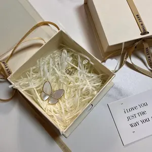 लक्जरी उपहार आभूषण बॉक्स कान की बाली कंगन हार अंगूठी घड़ी पुस्तक आकार बॉक्स पैकेजिंग आभूषण बॉक्स कस्टम रिबन के साथ