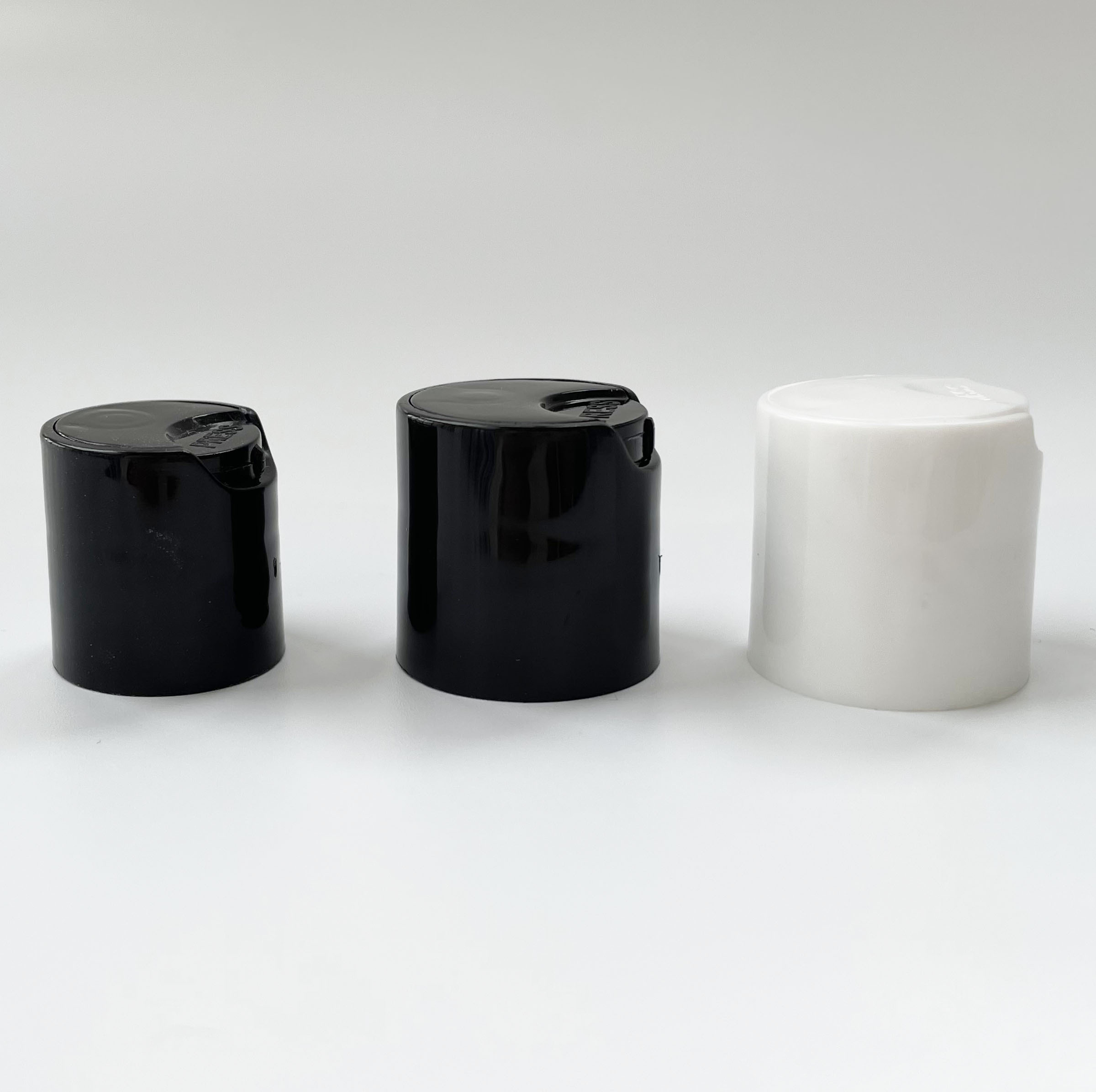 thumbnail image 2 of 24-410 Black PP Disc Top Cap (.308 Orifice). Pipeline Packaging 2 of 14