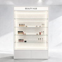 Vitrine à parfums en verre chêne clair avec cadre en métal noir, certifiée CE ETL, directement de l'usine, avec éclairage LED et boîte lumineuse pour présentation de cosmétiques