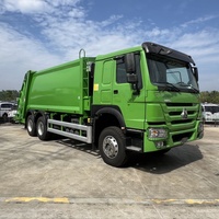Sinotruk Howo 20 CBM chargeur arrière compacteur camion à ordures 6x4 manuel diesel comprimé déchets comprennent moteur moteur boîte de vitesses vente