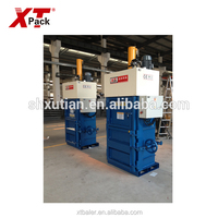 Presse à balles verticale hydraulique semi-automatique XTPACK de petite taille, fabriquée en Chine, 10 tonnes de pression, 2,2 kW de puissance, pour le conditionnement alimentaire