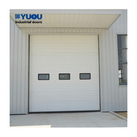 Ouvre-porte de levage vertical de sécurité automatique d'usine porte sectionnelle industrielle avec porte piétonne