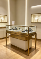 Vitrine de présentation de bijoux vintage en acier inoxydable doré avec tiroir de rangement, armoire en verre ultra-transparent avec éclairage LED intégré, design arrondi