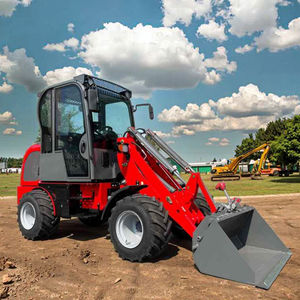 Chargeur frontal compact de 1 tonne avec seau de 0.5 verges cubes pour la manipulation de sol agricole à petite échelle et le déplacement de matériaux de jardin résidentiel - Product Image 1