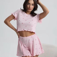 Vente en gros de pyjamas pour femmes en tissu extensible russe à volants, nouveau modèle Mujer, vêtements de maison, ensemble deux pièces à manches courtes avec bordure en forme de petit cœur, vêtements de détente
