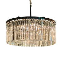 Lustre en cristal prismatique de luxe avec structure en métal noir pour maison à plafond haut