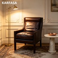 Fauteuil club rétro en cuir marron à dossier haut avec coussin de soutien, fauteuil individuel pour salon, garniture à clous en laiton, pieds en bois