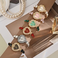 Montre-bracelet pour femme en alliage de quartz, exquise et mignonne, en forme de cœur, écologique, tendance, décontractée, luxueuse, avec aiguilles incrustées de diamants